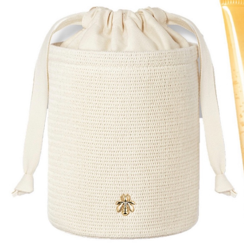 GUERLAIN | Cream Drawstring Bucket Bag
